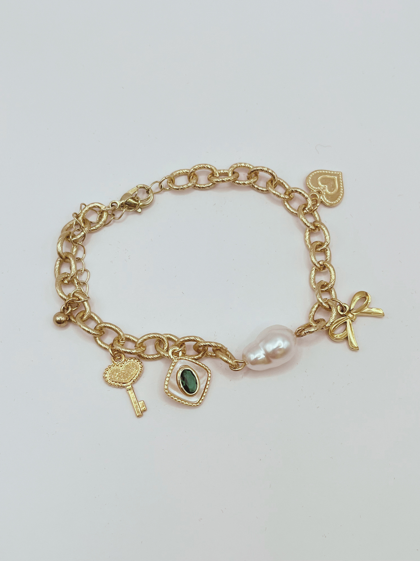 Golden Charm Bracelet with a Green Stone Charm