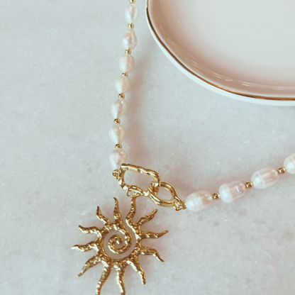 Fresh Water Pearl Necklace with Sun Pendant