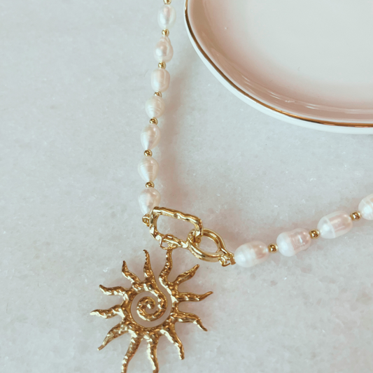 Fresh Water Pearl Necklace with Sun Pendant