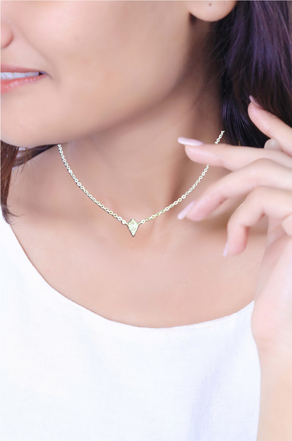 Sterling silver necklace with a diamond shape charm